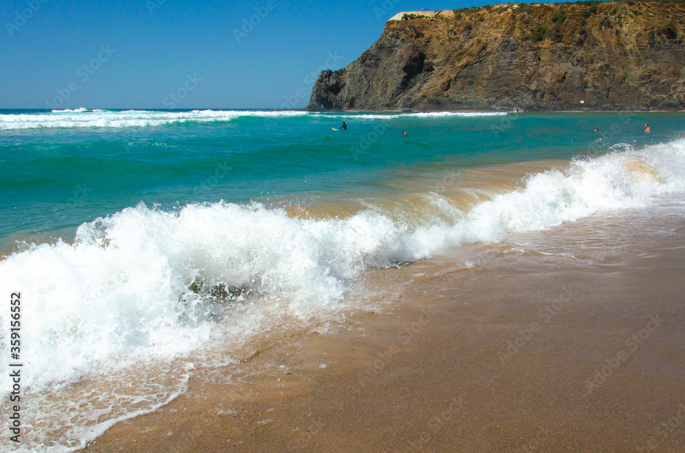 beautiful view of the beach coast of the Atlantic ocean in Portugal. Tourism and recreation. Waves break on the shore, banner. beautiful view of the beach coast of the Atlantic ocean in Portugal. Tourism and recreation. Waves break on the shore, banner.