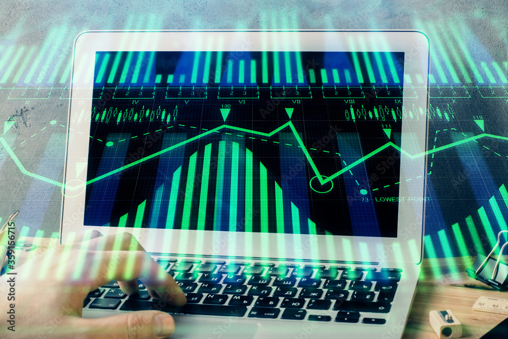 Double exposure of data internet theme hologram with man working on computer on background. Concept of innovation.