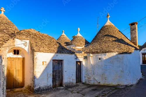 It's Typical trulli houses of Alberobello, a small town in Apulia, Italy. The Trulli of Alberobello have are a UNESCO World Heritage site since 1996