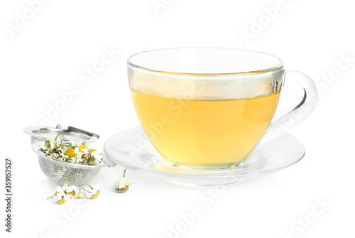 Fresh chamomile tea and dry flowers in infuser isolated on white