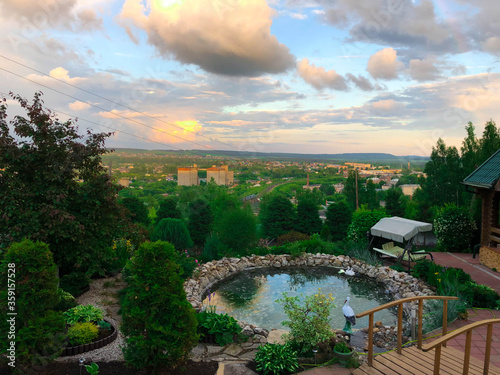 pond overlaid with stone against the sky in the afternoon