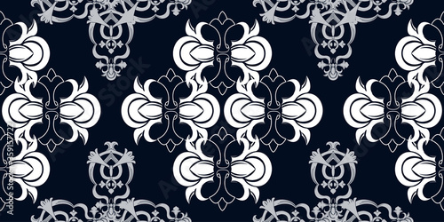 Vector elegan tile ornate seamless pattern. White ornament on luxury elegant blue background Retro hindu monochrome motif
