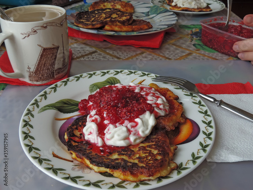 Wallpaper Mural Breakfast of cottage cheese pancakes, cheesecakes with raspberries and sour cream. Torontodigital.ca