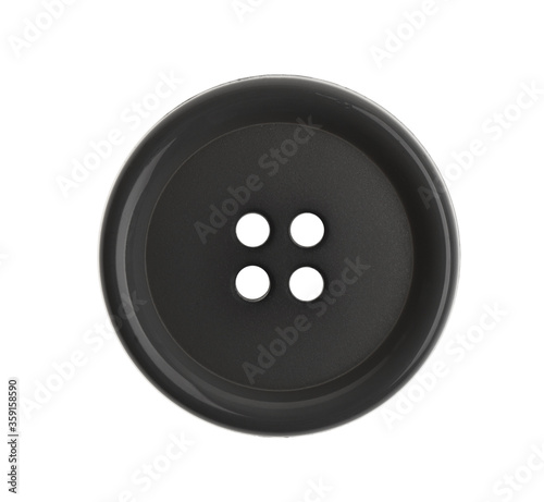 Dark plastic sewing button isolated on white