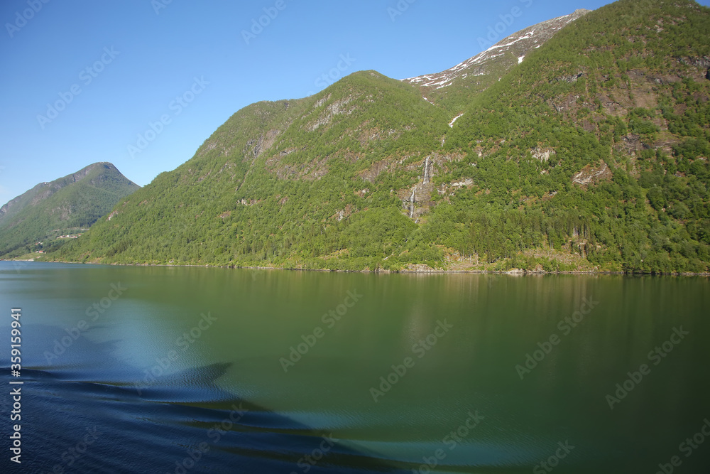 Beautiful calm Norwegian fjord and mountain landscape of the Sognefjord or Sognefjorden, Vestland county in Western Norway.