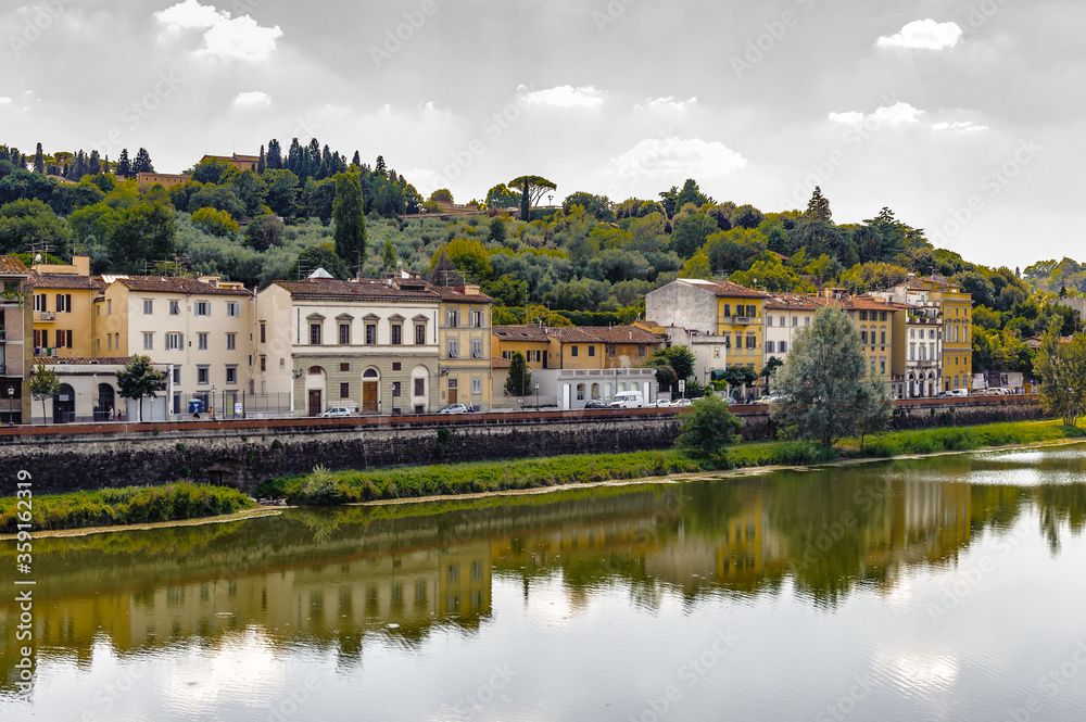 It's River Arno and the building of Florence, Italy