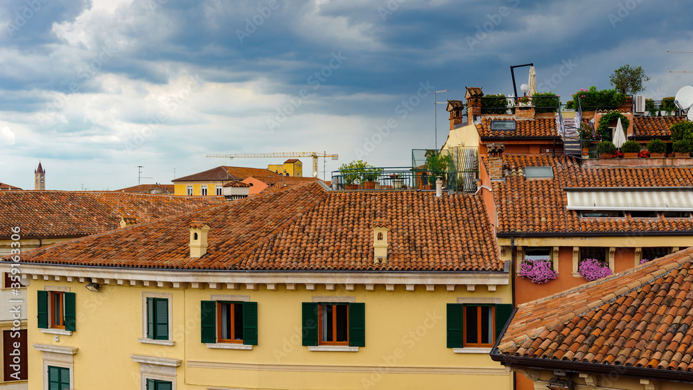 It's Panorama of the roof tops of Verona, Italy. City of Verona is a UNESCO World Heritage site