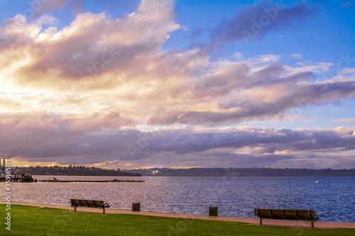 A hydroplane taking off from lake Rotorua towards sunset © Irina B