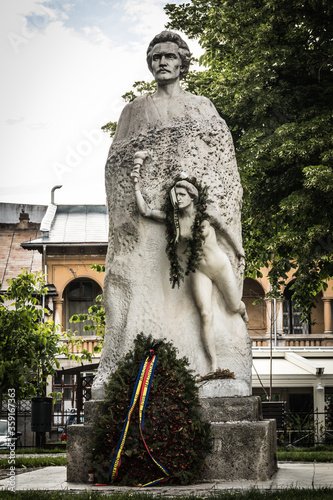 Statue of Mihai Eminescu Central park of Galati , Romania photo