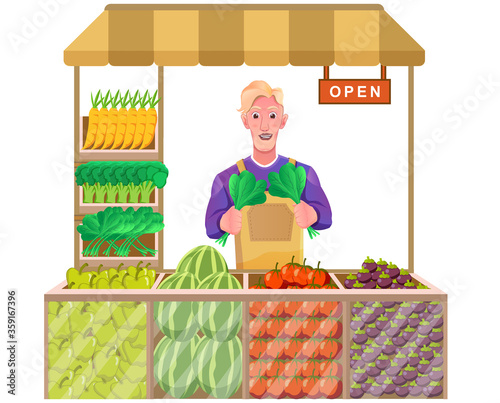 shopkeeper with fresh fruit and vegetables