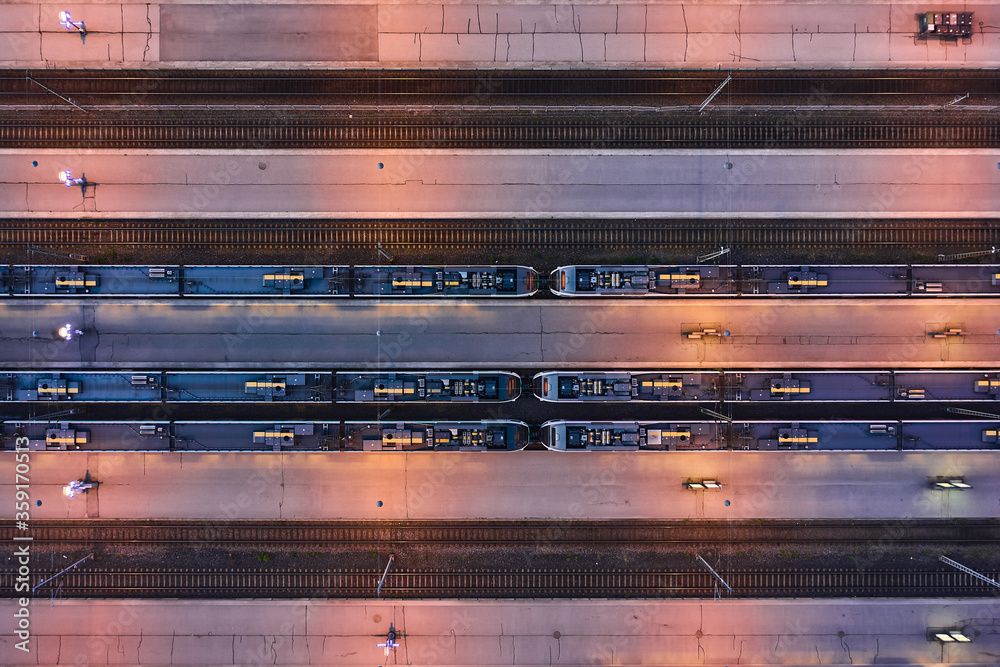 Aerial view of railway station, looking straight down with a satellite image style. Aerial view of railway station, looking straight down with a satellite image style.