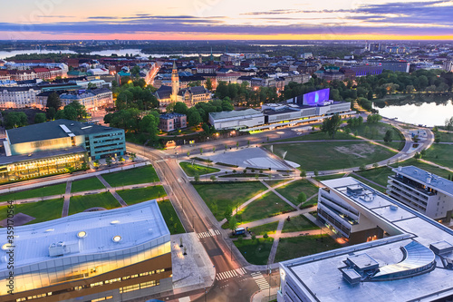 Obraz na płótnie Aerial view of Park in central Helsinki, Finland. In picture Toolonlahden park, Finlandia Hall, library Oodi. Summer night in Helsinki. w salonie