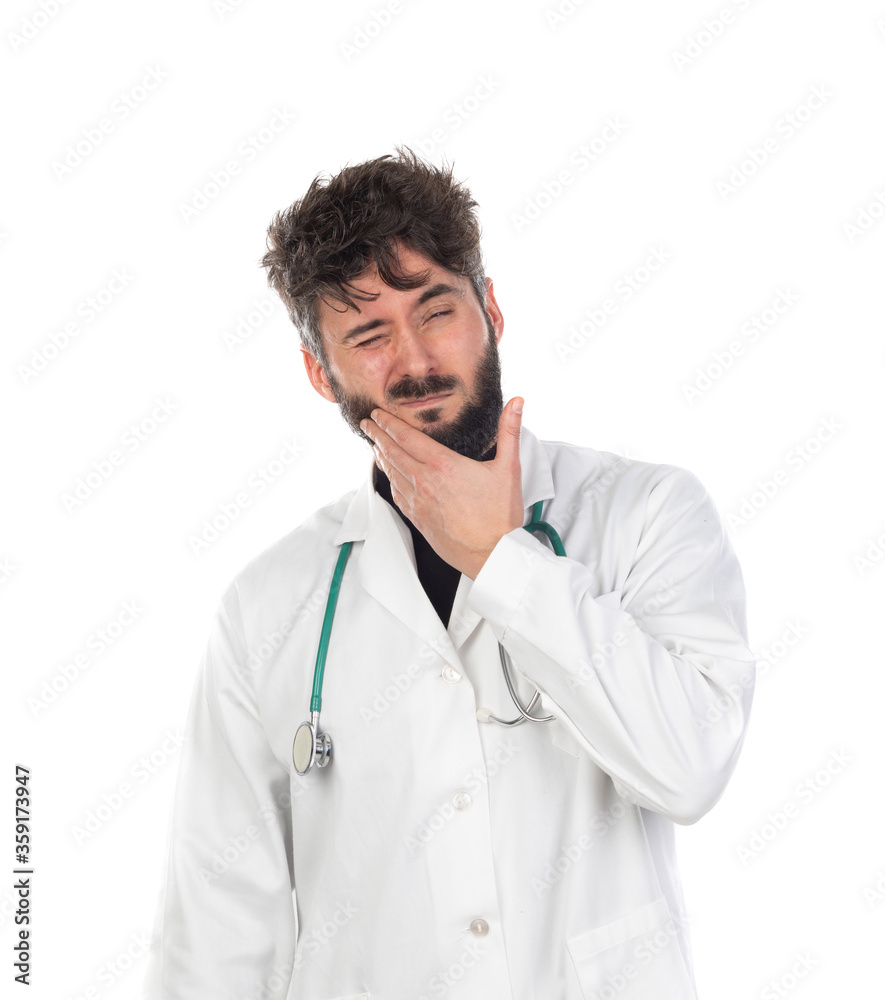 Young doctor with beard wearing a medical gown Young doctor with beard wearing a medical gown