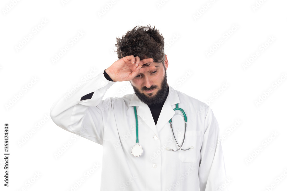 Young doctor with beard wearing a medical gown Young doctor with beard wearing a medical gown