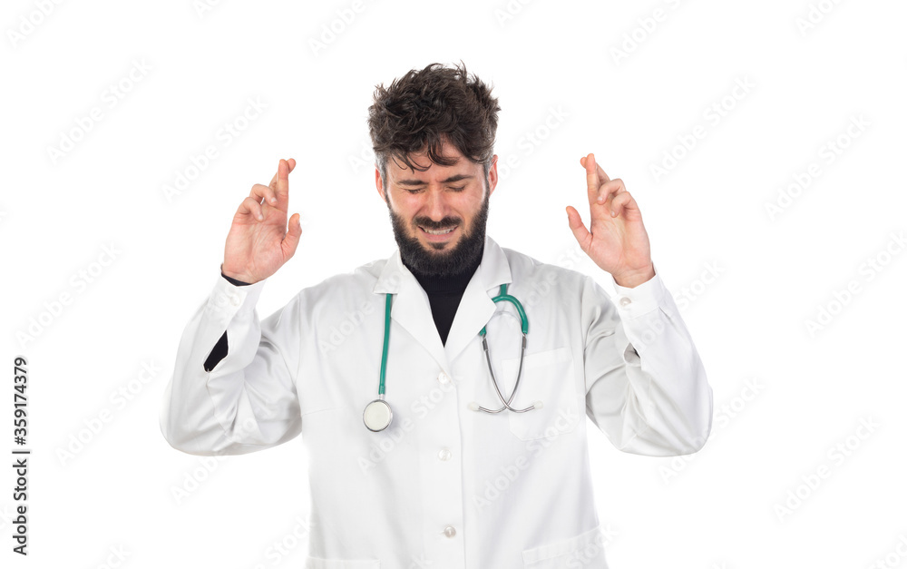Young doctor with beard wearing a medical gown Young doctor with beard wearing a medical gown