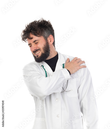 Young doctor with beard wearing a medical gown © Gelpi