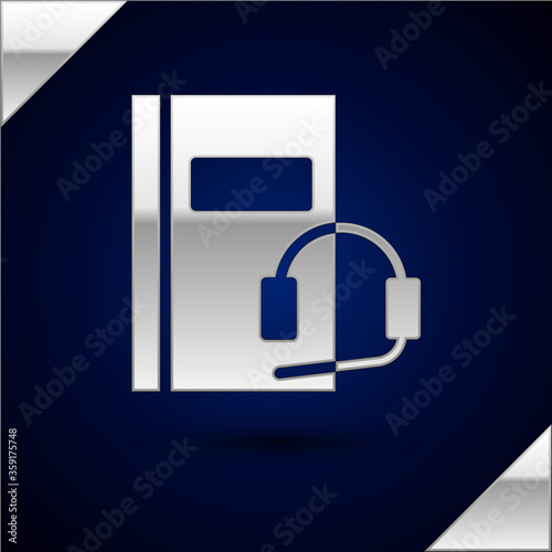 Silver Audio book icon isolated on dark blue background. Book with headphones. Audio guide sign. Online learning concept. Vector Illustration.