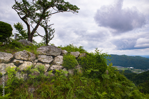 Hyogo prefecture・stone wall, A long time ago, there was a castle on the summit of the Samurai era, and the castle owner sees rice growing in the west territory from the castle wall.