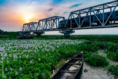 sunset near a bridge