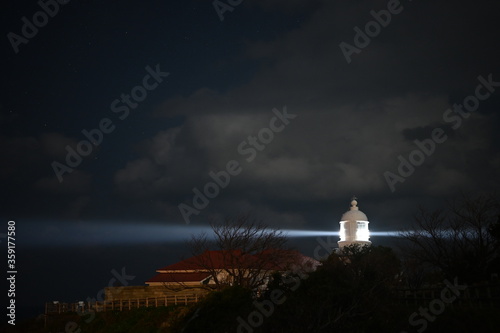 lighthouse hinomisaki at night photo