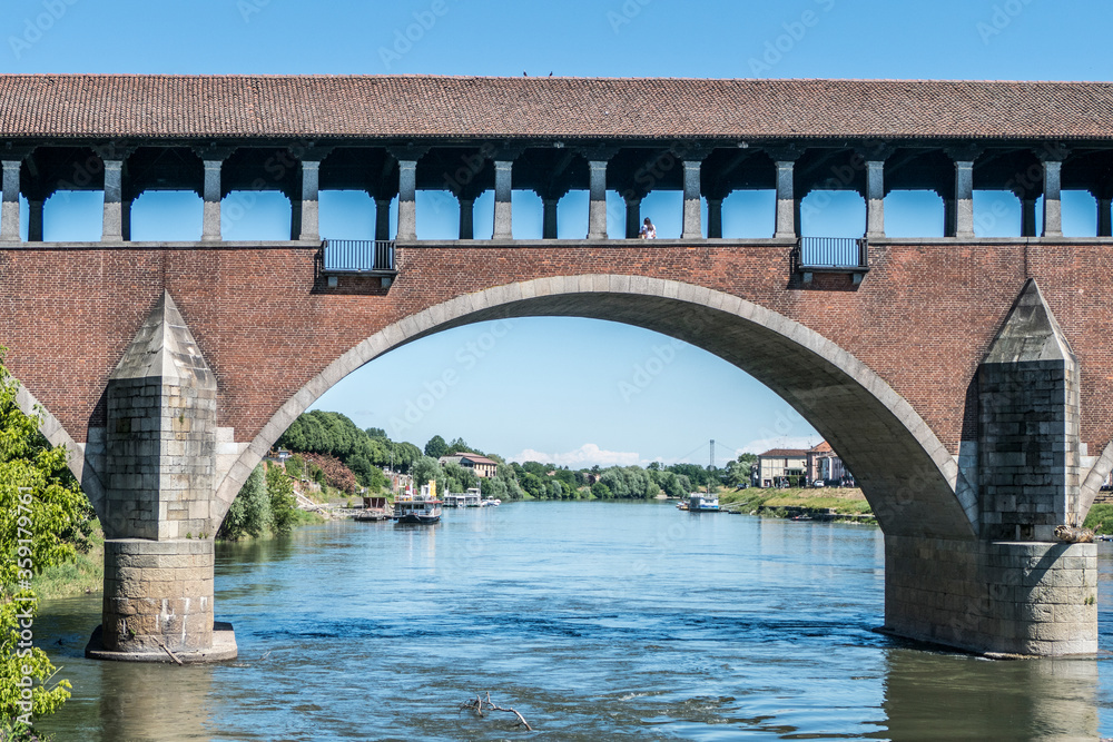 Fototapeta premium The covered bridge over the Ticino river in Pavia