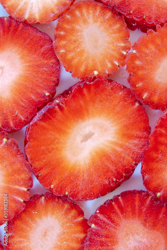 Appetizing slices of juicy strawberries.