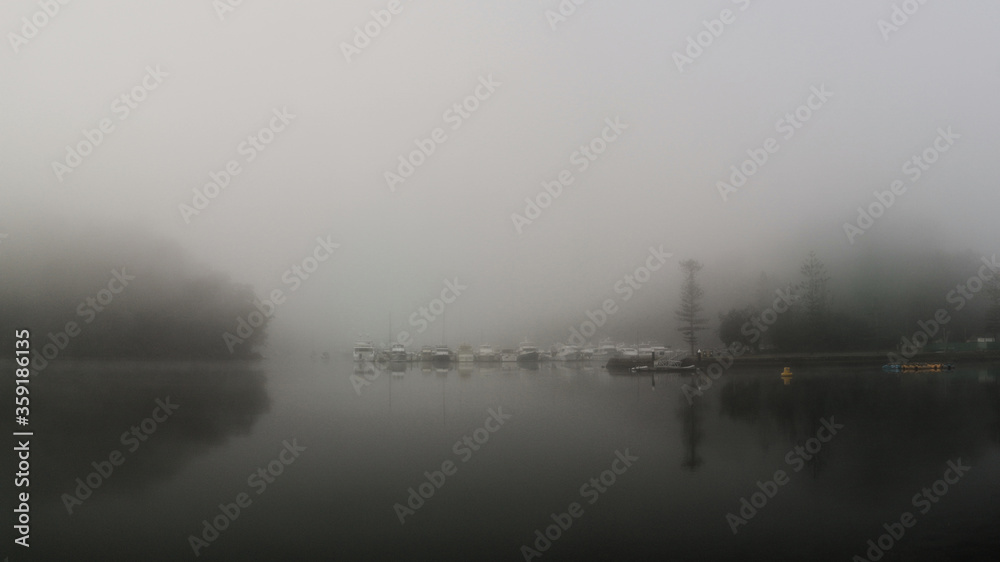 Fototapeta premium Early morning foggy view of Cowan creek, Bobbin Head, Ku-ring-gai Chase National Park, New South Wales, Australia