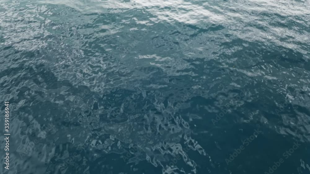 Texture of water surface of sea reflection of sun's rays. Sun glare on blue water aerial view from drone at low altitude on sunset summer. Motion of small waves. Sea idyll. Relax Texture of water surface of sea reflection of sun's rays. Sun glare on blue water aerial view from drone at low altitude on sunset summer. Motion of small waves. Sea idyll. Relax