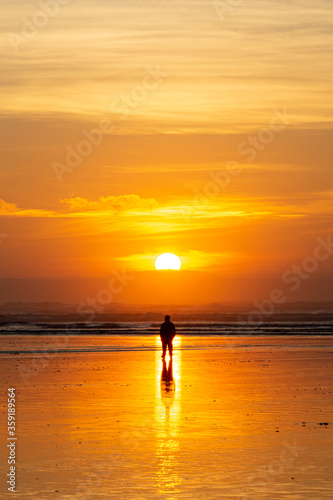 Silhouetted Man at Sunset on the Beach  - Saunton, Devon, England © caz_che
