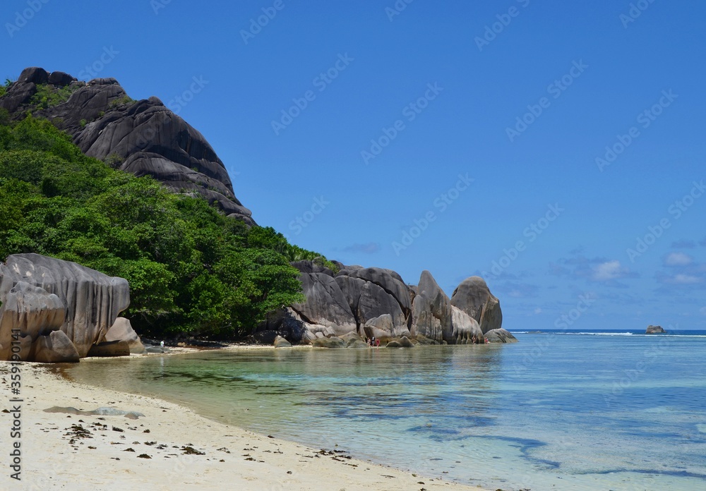 Idyllic beach with giant granite rocks on La Digue island, Seychelles