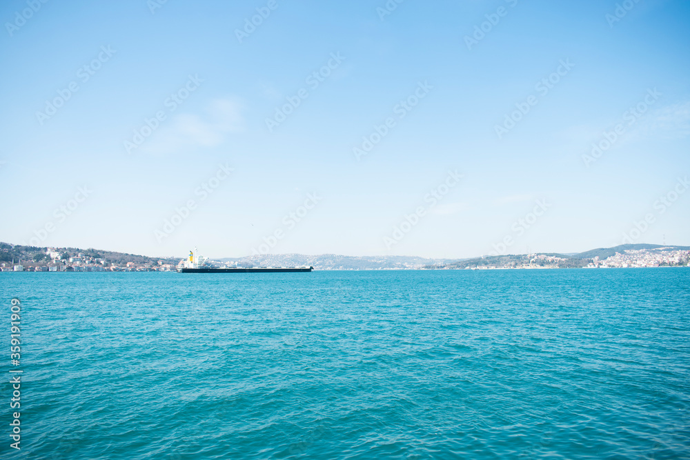 large cargo ship passing through the Bosphorus of Istanbul large cargo ship passing through the Bosphorus of Istanbul
