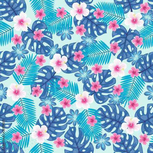 Seamless pattern with a tropical leaves of monstera and areca trees and hibiscus flowers