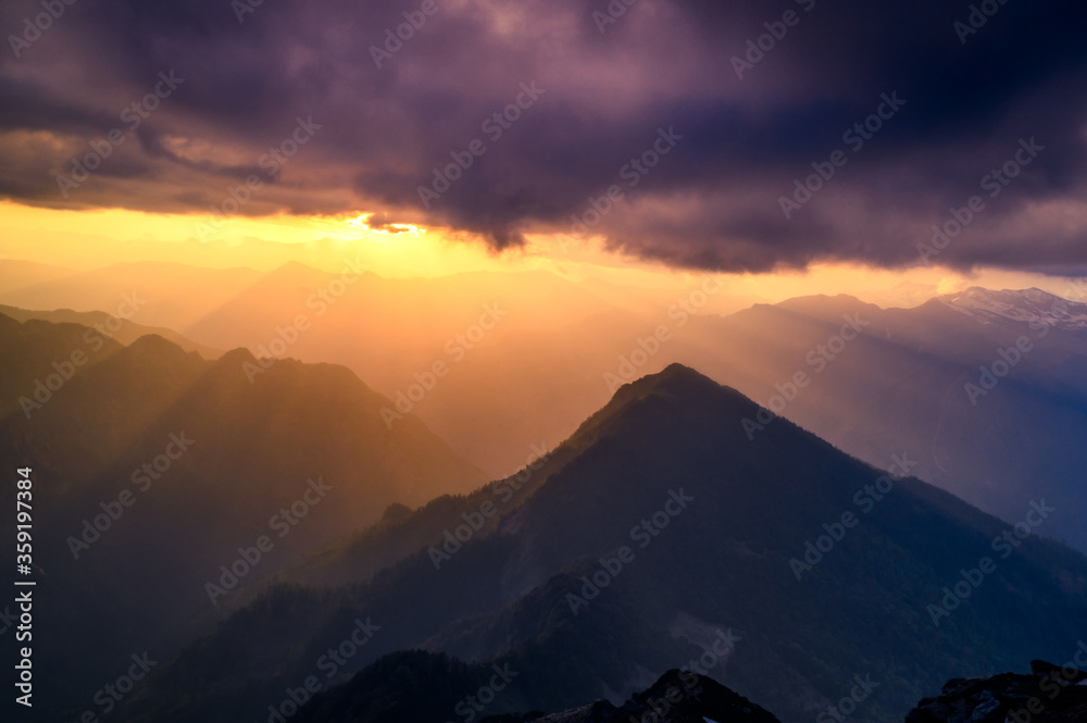 Sunrise on the  Himalayan mountains on trek to Sar pass. Kasol, Parvati valley, Himachal Pradesh, northern India.