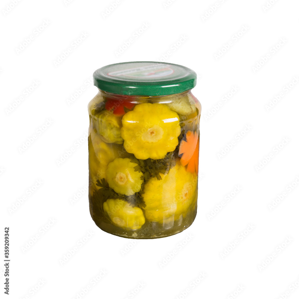 Canned vegetables in a glass jar. Isolated on white background Canned vegetables in a glass jar. Isolated on white background