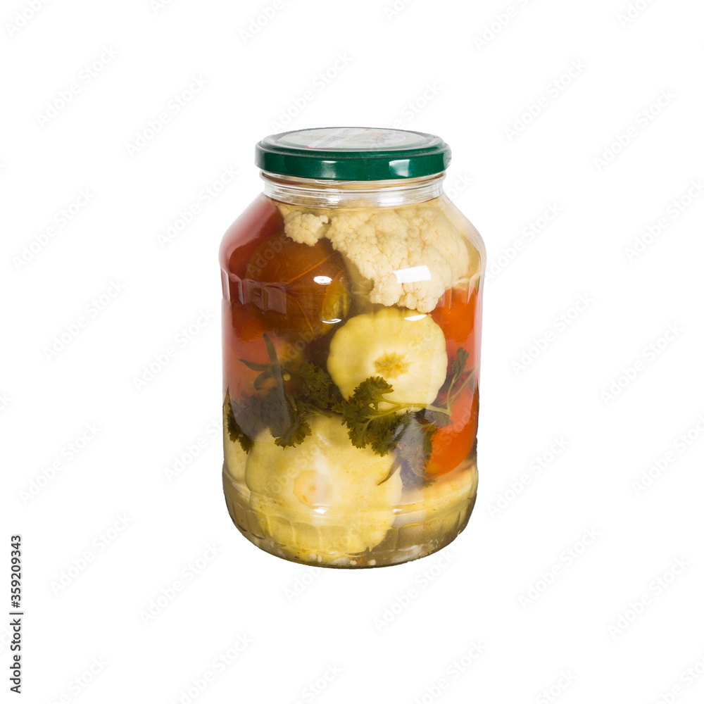 Canned vegetables in a glass jar. Isolated on white background Canned vegetables in a glass jar. Isolated on white background