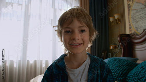 Boy having a video call at home