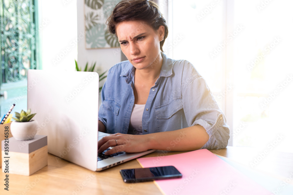 woman working on computer at home woman working on computer at home