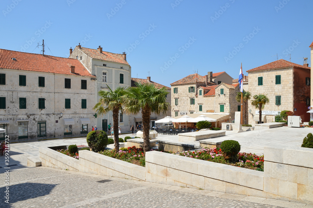 A square in the Croatian town of Makarska on a summer day.