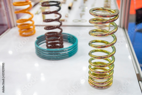 The wire coil spring parts for industrial purpose. The sample of coating coil spring for anti corrosion purpose. photo