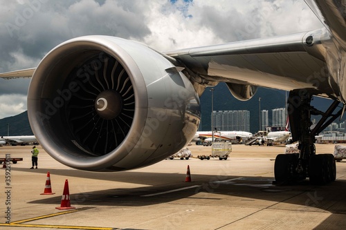 A large jet engine from ground level.