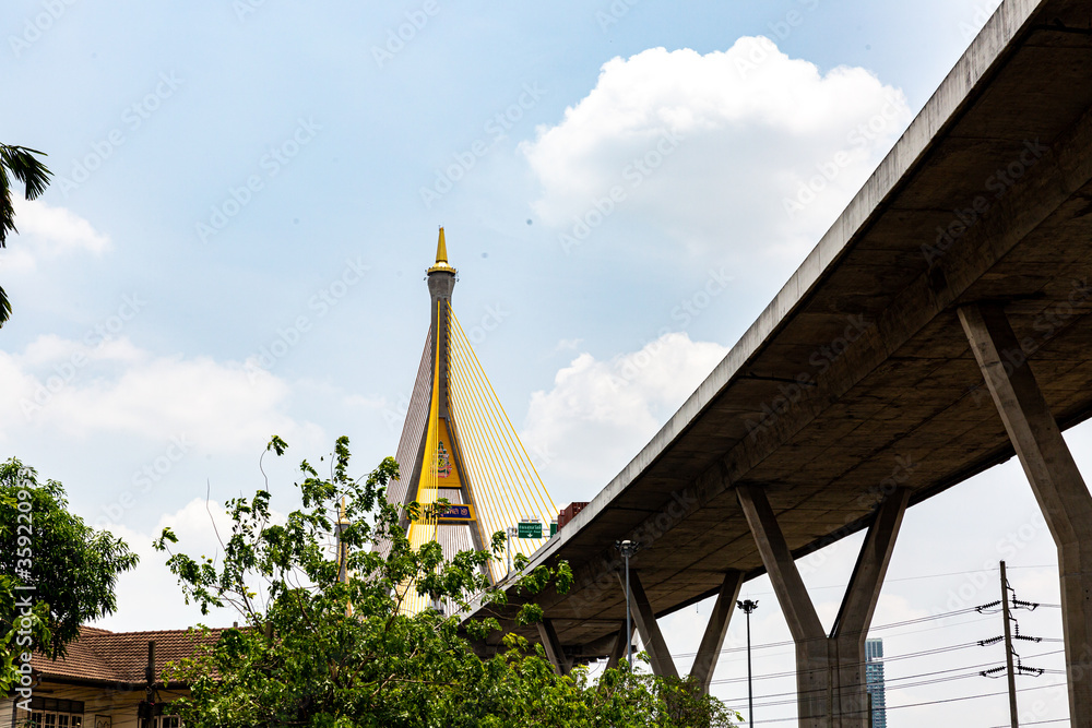 BANGKOK ,THAILAND - MAY 22, 2020 : Bhumibol Bridge in Thailand, also known as the Industrial Ring Road Bridge, in Thailand. The bridge crosses the Chao Phraya River. BANGKOK ,THAILAND - MAY 22, 2020 : Bhumibol Bridge in Thailand, also known as the Industrial Ring Road Bridge, in Thailand. The bridge crosses the Chao Phraya River.