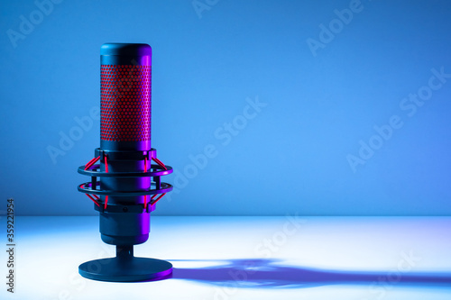 Microphone on a blue backgr...