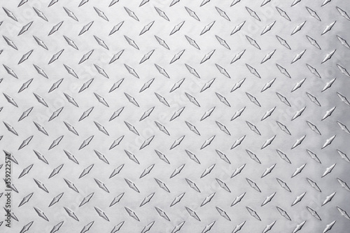 фотографія metallic steel plate with diamond pattern