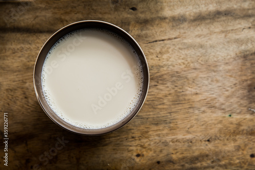 A picture of tofu on a wooden table