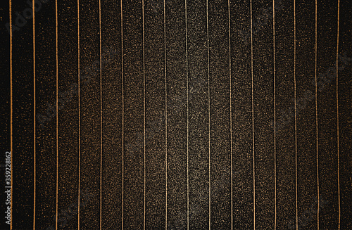 Distress grunge vector texture of knitted fabric, sweater, pullover, jersey with vertical stripes. Black and white background.