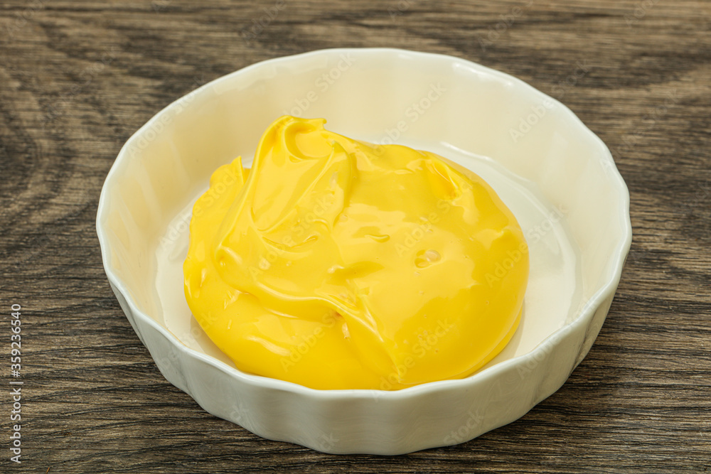 Natural cheese sauce in the bowl Natural cheese sauce in the bowl