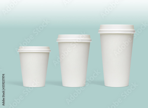 Wallpaper Mural White blank large, medium and small size takeaway paper, carton or cardboard coffee cups with white caps packaging template mockup isolated on light green background including clipping path.  Torontodigital.ca