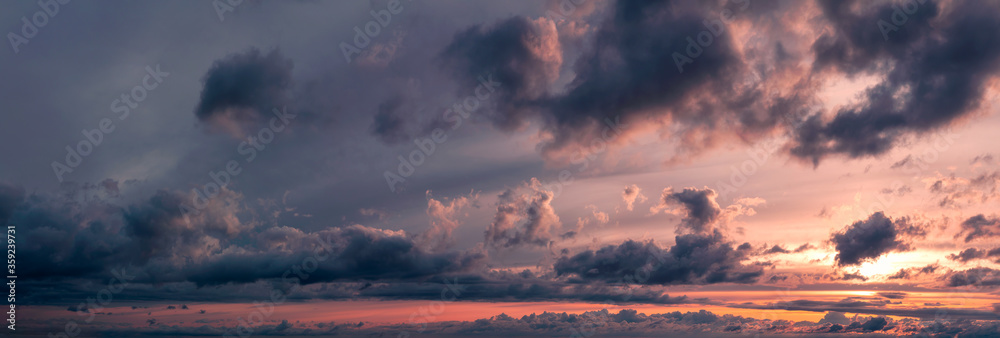 Beautiful Panoramic View of Cloudscape during a colorful sunset or sunrise. Taken on the West Coast of British Columbia, Canada.