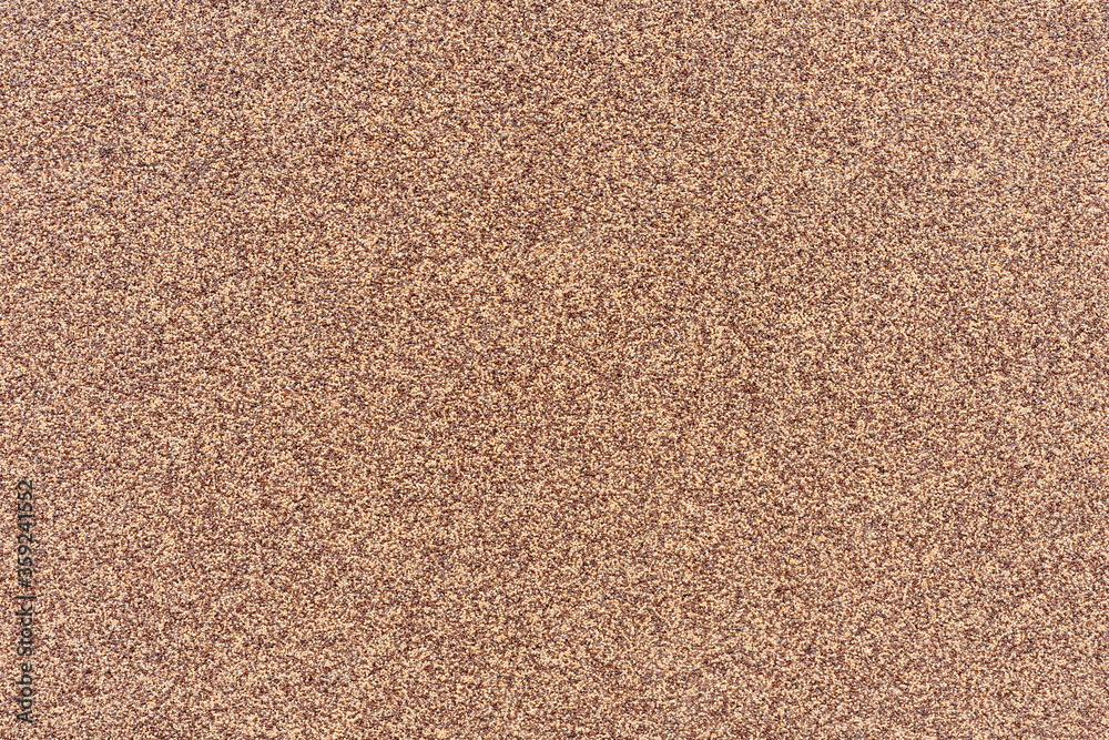 Fototapeta premium Light brown background with dark brown speckles