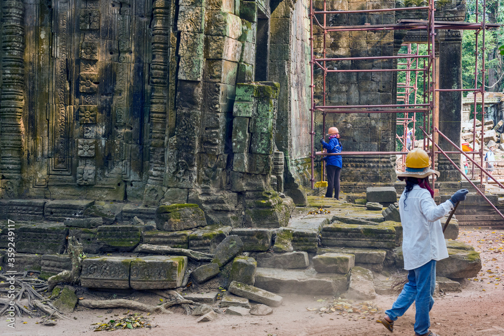 restoration works in Ta Prohm temple in Siem Reap, Cambodia restoration works in Ta Prohm temple in Siem Reap, Cambodia